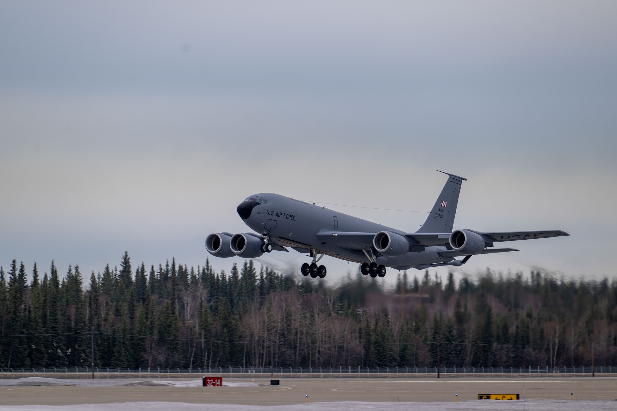 A KC-135 assigned to the 168th Wing, Alaska Air National Guard, takes off.