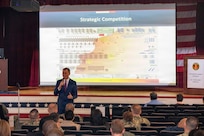 260504-N-KC192-1014 PORTSMOUTH, Va. (May 4, 2026) Dr. Michael McGinnis, Bureau of Medicine and Surgery (BUMED) executive director, gives opening remarks during the 2026 Medical Logistics Symposium held on board Naval Medical Center Portsmouth, May 4, 2026. The Navy Medicine Logistics Symposium aims to maintain a common operating picture and update the Medical Logistics community regarding the fiscal year 2026 Navy Medicine Campaign Order and the Navy MEDLOG goal to build a logistics system that delivers ready operational units to support the Naval Strategy. (U.S. Navy photo by Mass Communication Specialist Second Class Levi Decker)