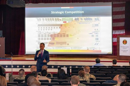 260504-N-KC192-1014 PORTSMOUTH, Va. (May 4, 2026) Dr. Michael McGinnis, Bureau of Medicine and Surgery (BUMED) executive director, gives opening remarks during the 2026 Medical Logistics Symposium held on board Naval Medical Center Portsmouth, May 4, 2026. The Navy Medicine Logistics Symposium aims to maintain a common operating picture and update the Medical Logistics community regarding the fiscal year 2026 Navy Medicine Campaign Order and the Navy MEDLOG goal to build a logistics system that delivers ready operational units to support the Naval Strategy. (U.S. Navy photo by Mass Communication Specialist Second Class Levi Decker)