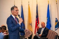 260504-N-KC192-1008 PORTSMOUTH, Va. (May 4, 2026) Dr. Michael McGinnis, Bureau of Medicine and Surgery (BUMED) executive director, gives opening remarks during the 2026 Medical Logistics Symposium held on board Naval Medical Center Portsmouth, May 4, 2026. The Navy Medicine Logistics Symposium aims to maintain a common operating picture and update the Medical Logistics community regarding the fiscal year 2026 Navy Medicine Campaign Order and the Navy MEDLOG goal to build a logistics system that delivers ready operational units to support the Naval Strategy. (U.S. Navy photo by Mass Communication Specialist Second Class Levi Decker)