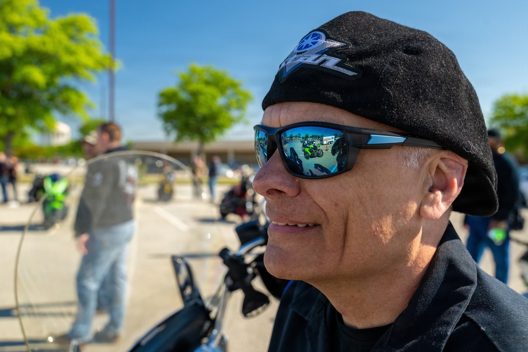 A guy wearing sunglasses.