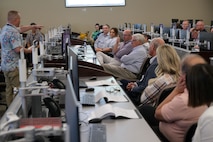 photo of USAF civilian speaks to civic leaders