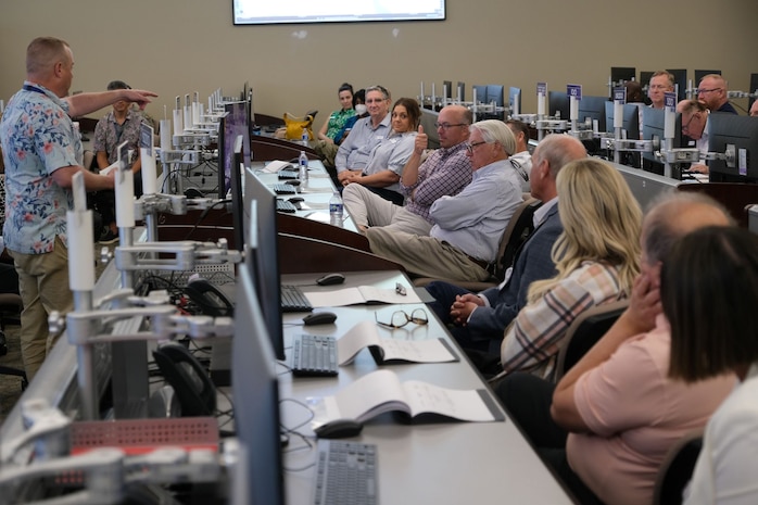 photo of USAF civilian speaks to civic leaders