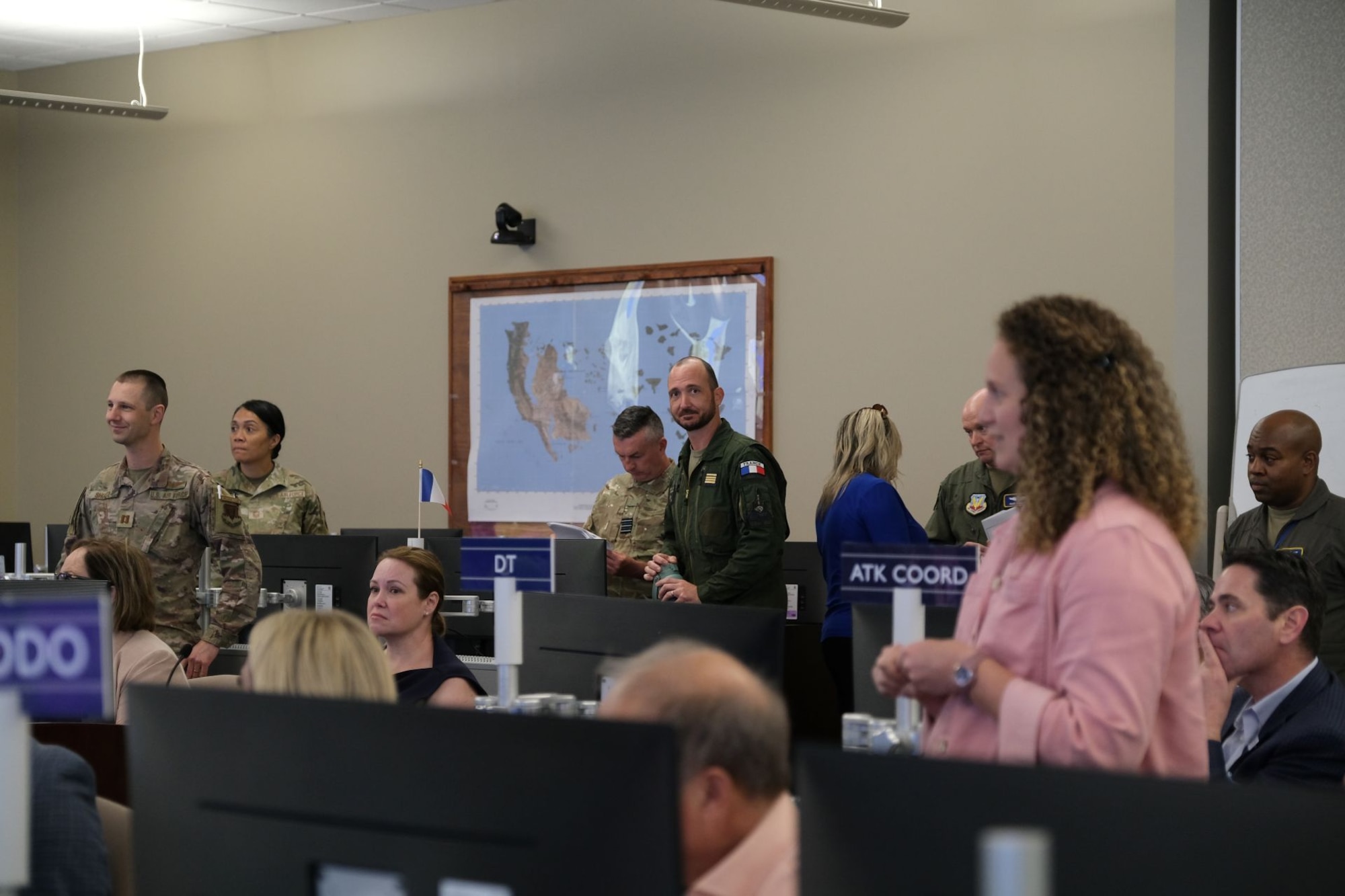 photo of USAF, French Air Force member, civic leaders in a AOC