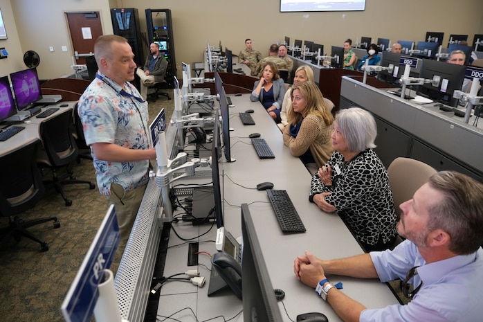 photo of USAF civilian speaks to civic leaders
