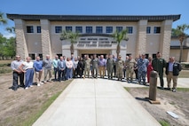 photo of ACC, 505th Command and Control Wing, RAF, RAAF, French Air Force members, and ACC civic leaders stand for a photo