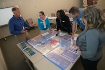 photo of USAF Civilian briefing civic leaders