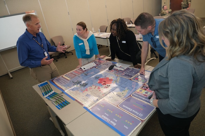 photo of USAF Civilian briefing civic leaders