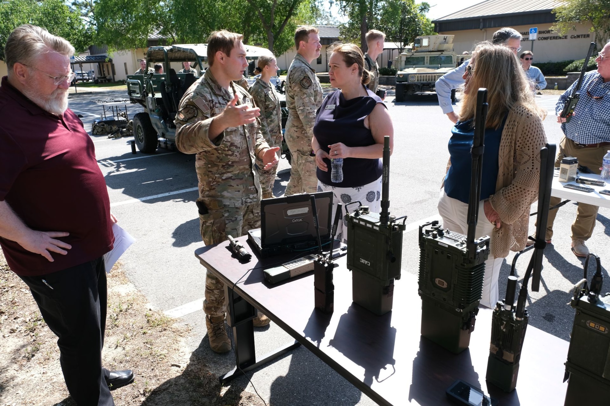 TACPs demo gear with civic leaders