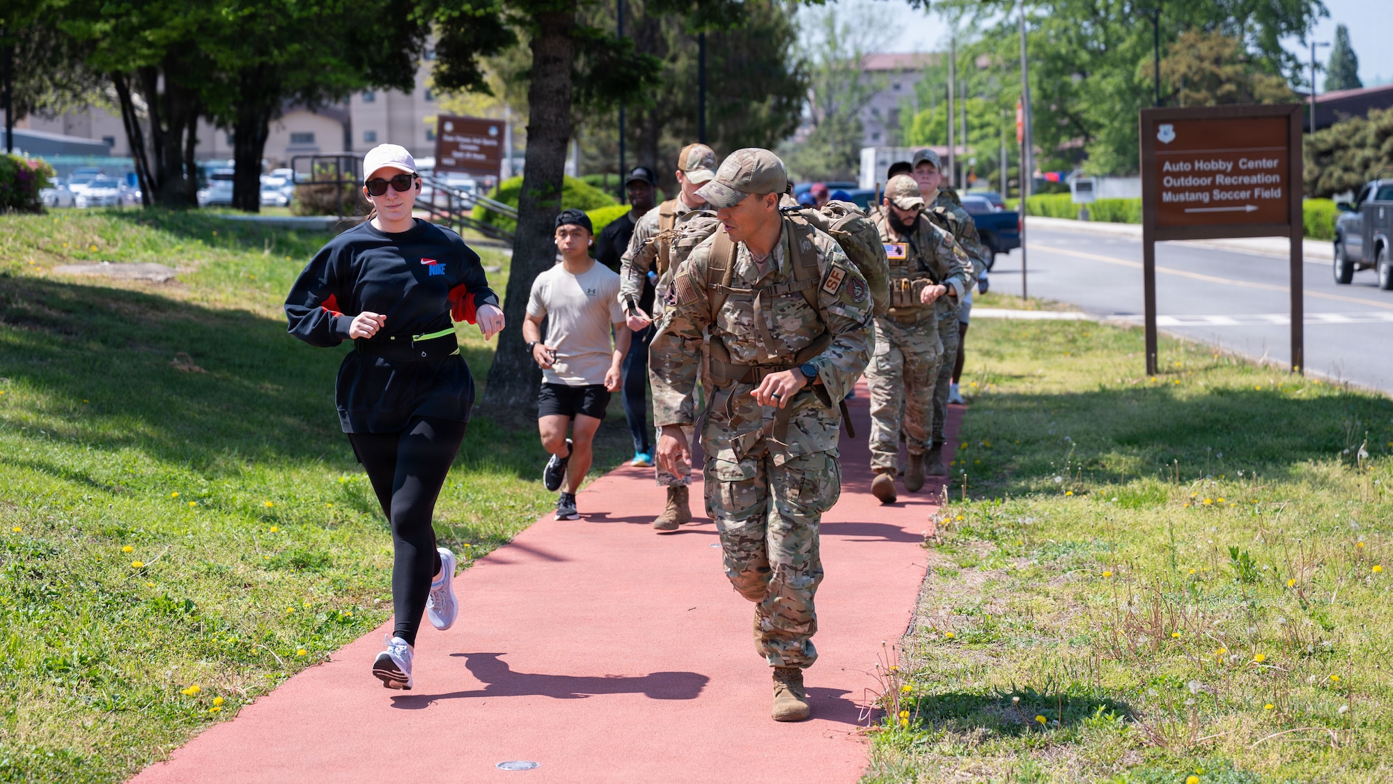 U.S. Airmen assigned to the 51st Security Forces Squadron participate in a group run during Police Week at Osan Air Base, Republic of Korea, May 4, 2026. Participants completed the run in honor of fallen law enforcement officers while promoting physical readiness and resilience. (U.S. Air Force photo by Senior Airman Rome Bowermaster)