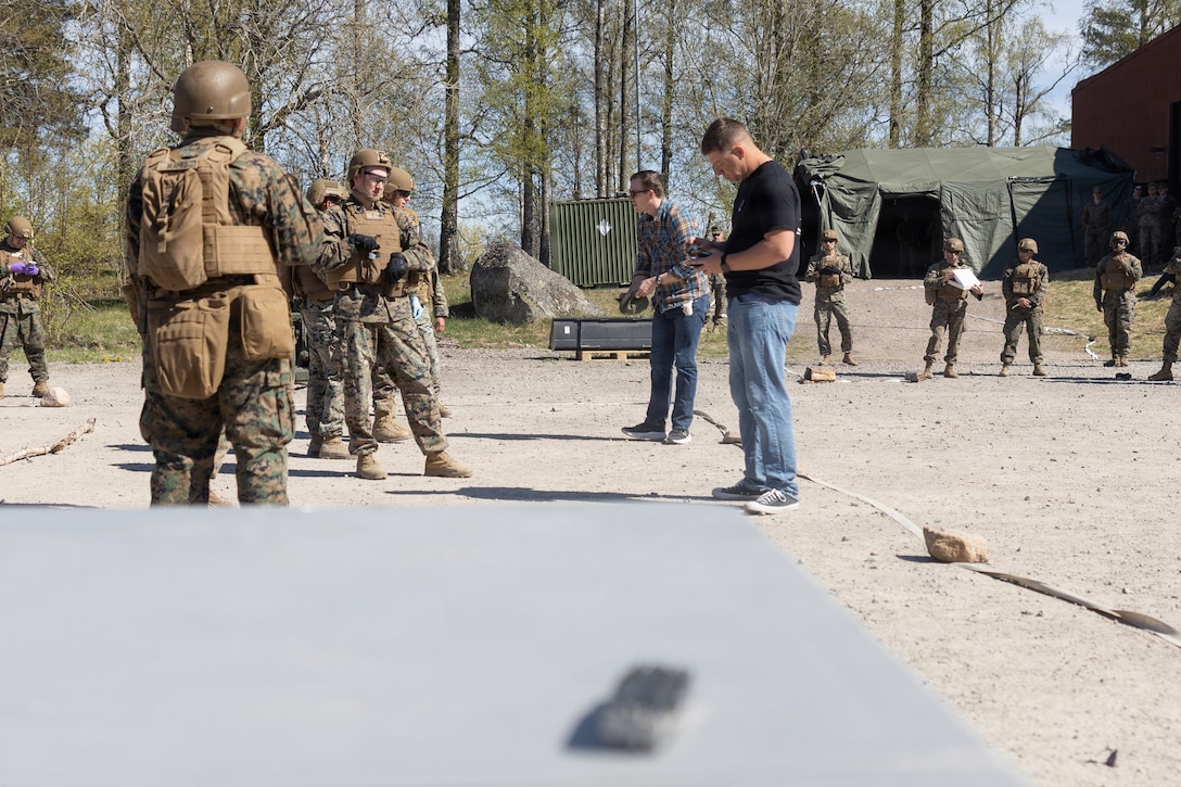 U.S. Marines with Combat Logistics Battalion 24, Combat Logistics Regiment 27, 2nd Marine Logistics Group, execute evacuation control center procedures during exercise Aurora 26 in Kvarn, Sweden, April 30, 2026. U.S. Marines and Sailors with 2nd MLG are participating in exercise Aurora as part of the larger U.S. Army-led Sword 26 series of linked multinational exercises, which directly supports NATO's Eastern Flank Deterrence Initiative concept, validates defense plans, builds a unified lethal force, and strengthens deterrence. (U.S. Marine Corps photo by Lance Cpl. Talan Werner)