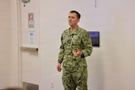 Lt. j.g. David Naiman, environmental health officer and Preventive Medicine Department head assigned to Navy Medicine Readiness and Training Command Twentynine Palms, leads an influenza pandemic tabletop exercise at the command April 9, 2026. The discussion-based exercise evaluated the command’s emergency response procedures, Hospital Incident Command System activation, and operational readiness during a simulated H7N3 influenza pandemic scenario. (U.S. Navy photo by Christopher Jones, NMRTC / NH Twentynine Palms public affairs officer)