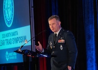 U.S. Air Force Col. Jimmy Schlabach gives remarks during the Nuclear Triad Symposium.