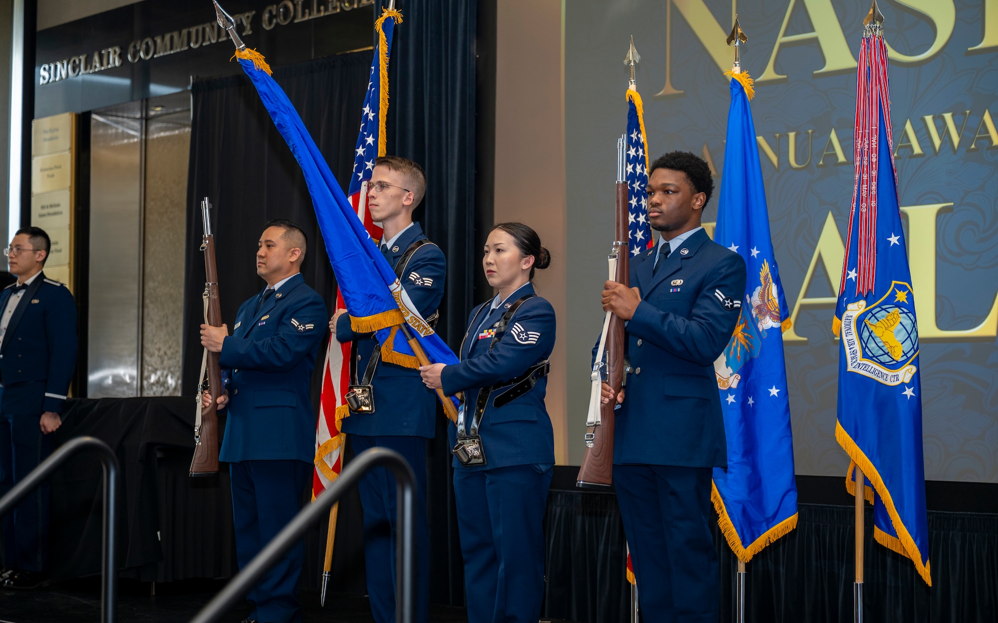 The National Air and Space Intelligence Center color guard presents the colors during the national anthem at the 2025 NASIC Annual Awards Ball.