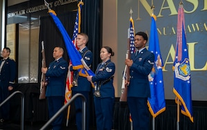 The National Air and Space Intelligence Center color guard presents the colors during the national anthem at the 2025 NASIC Annual Awards Ball.