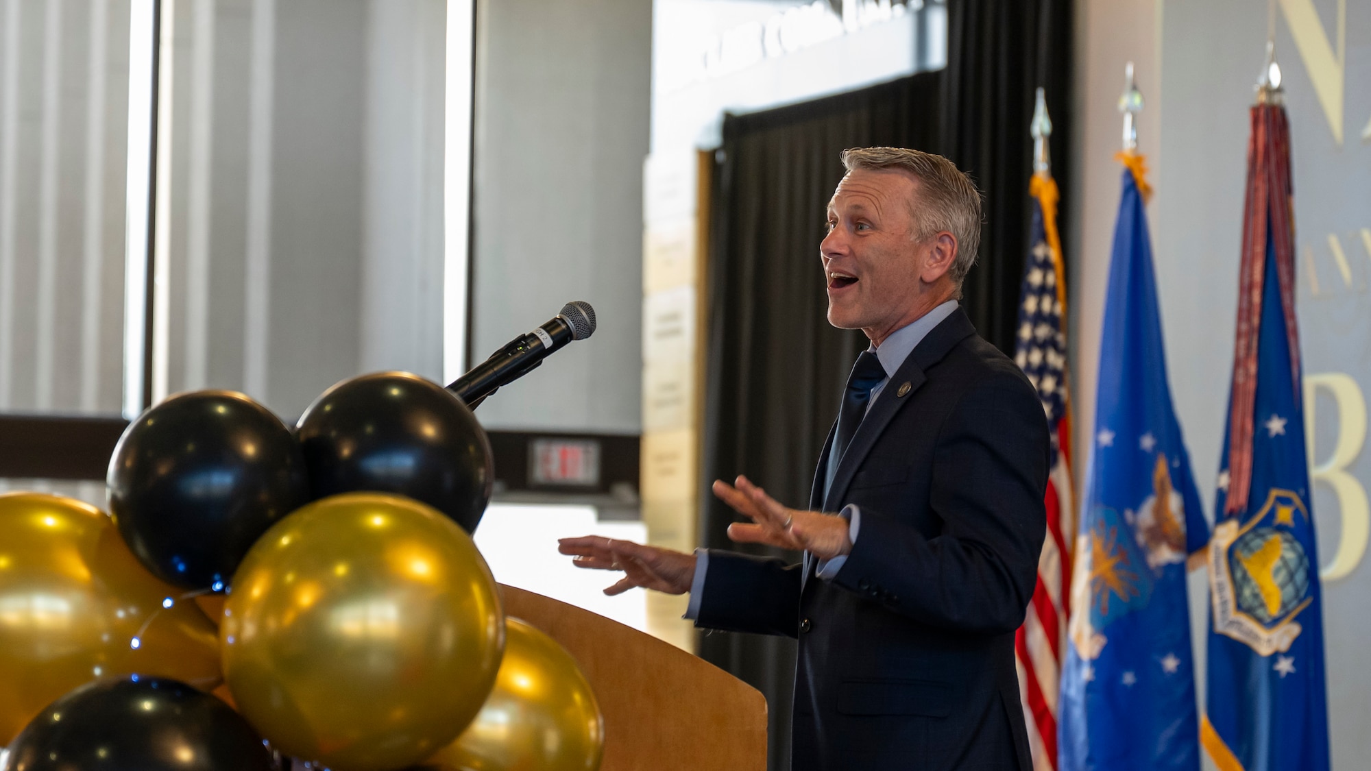 Dr. Jason Womack delivers remarks as the featured guest speaker during the 2025 National Air and Space Intelligence Center Annual Awards Ball.