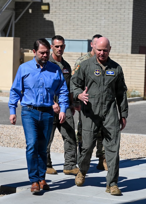 U.S. Air Force Brig. Gen. David Berkland, 56th Fighter Wing commander, escorts Sen. Ruben Gallego during a visit to Luke Air Force Base, Arizona, May 7, 2026. Gallego’s visit highlighted the importance of community and stakeholder partnerships and showcased Luke AFB’s culture of teamwork and combat-ready mission transparency. (U.S. Air Force photo by Airman 1st Class Rebecca Wagner)