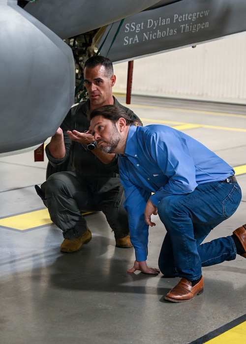 A U.S. Air Force F-35A Lightning II pilot explains aircraft components to Sen. Ruben Gallego inside a hangar at Luke Air Force Base, Arizona, May 7, 2026. Community engagement opportunities at the local and legislative level allow Luke AFB Airmen to showcase the installation’s combat-ready mission and commitment to interoperable operational excellence. (U.S. Air Force photo by Airman 1st Class Rebecca Wagner)