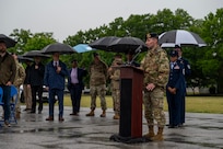 U.S. Air Force Maj. Nicholas Cunningham, commander of the 11th Security Forces Squadron, delivers remarks during the opening ceremony for National Police Week on Joint Base Anacostia-Bolling, Washington, D.C., May 11, 2026. Cunningham emphasized the importance of National Police Week in honoring the men and women who have dedicated their lives to the protection of their communities. (U.S. Air Force photo by Hayden Hallman)