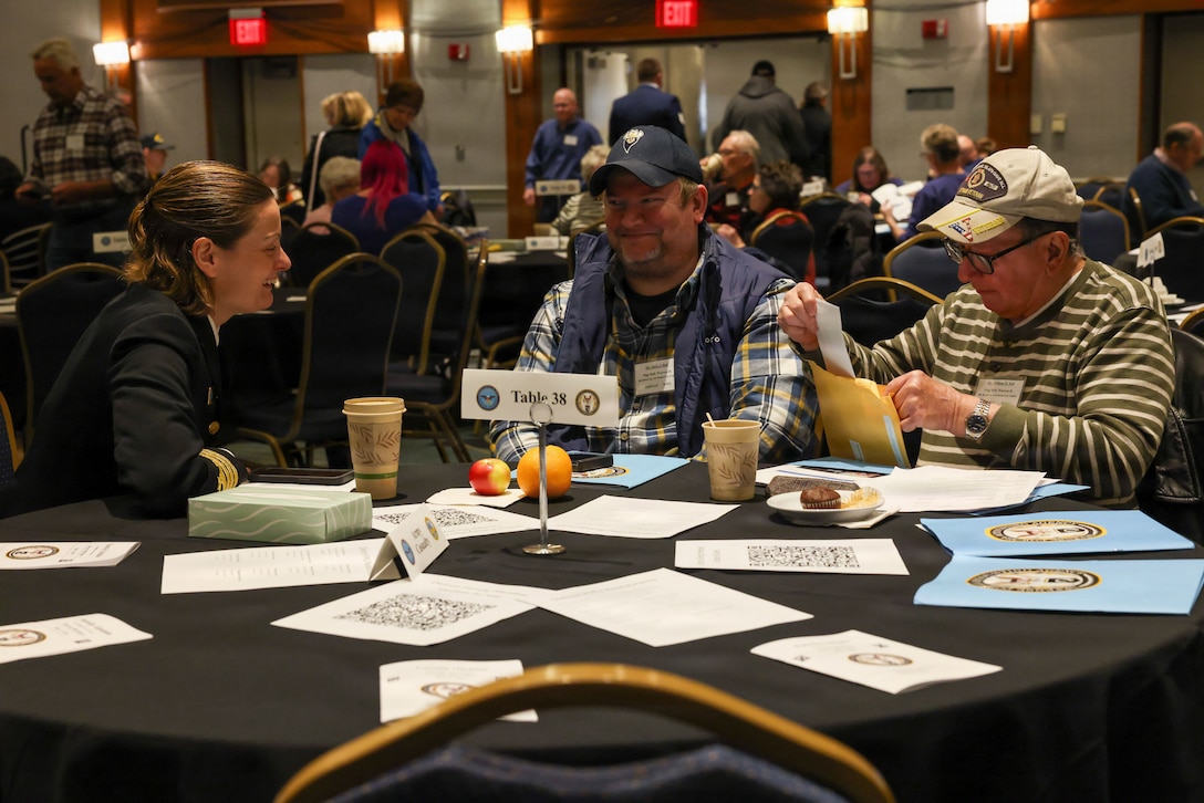 U.S. Navy Capt. Meghan Bodnar, Defense POW/MIA Accounting Agency, deputy director of operations, speaks to a family during the DPAA Family Member Update in Detroit, Mi., May 2, 2026.