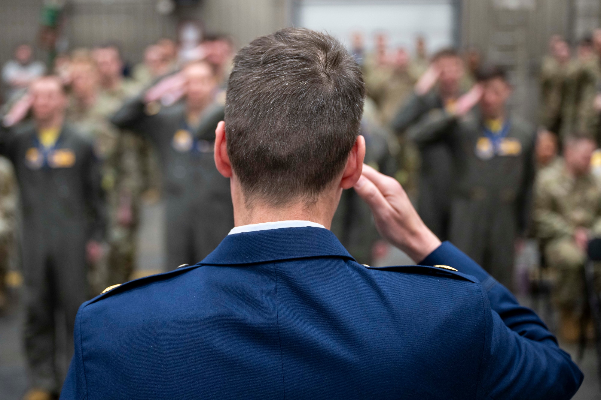 U.S. Air Force Maj. Harrison Gebs, 18th Fighter Interceptor Squadron commander, renders his first salute to members of the 18th FIS during a change of command ceremony at Eielson Air Force Base, Alaska, May 8, 2026.