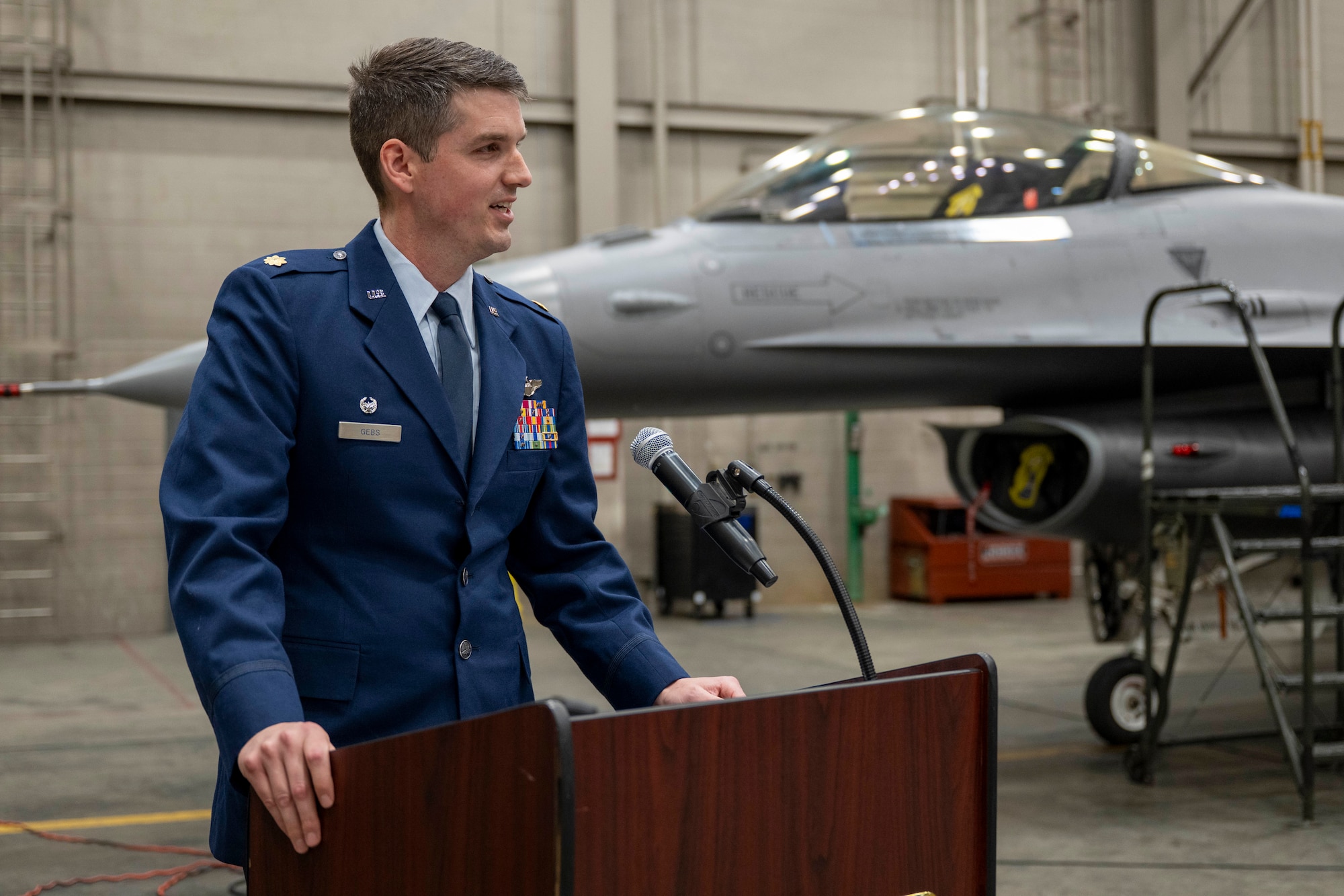 U.S. Air Force Maj. Harrison Gebs, 18th Fighter Interceptor Squadron commander, gives a speech during a change of command ceremony at Eielson Air Force Base, Alaska, May 8, 2026.