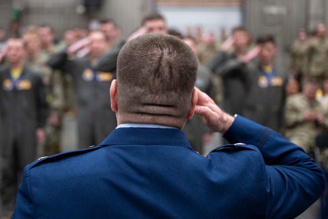 U.S. Air Force Lt. Col. Nathan Mondul, 18th Fighter Interceptor Squadron commander, renders his final salute to members of the 18th FIS during a change of command ceremony at Eielson Air Force Base, Alaska, May 8, 2026.