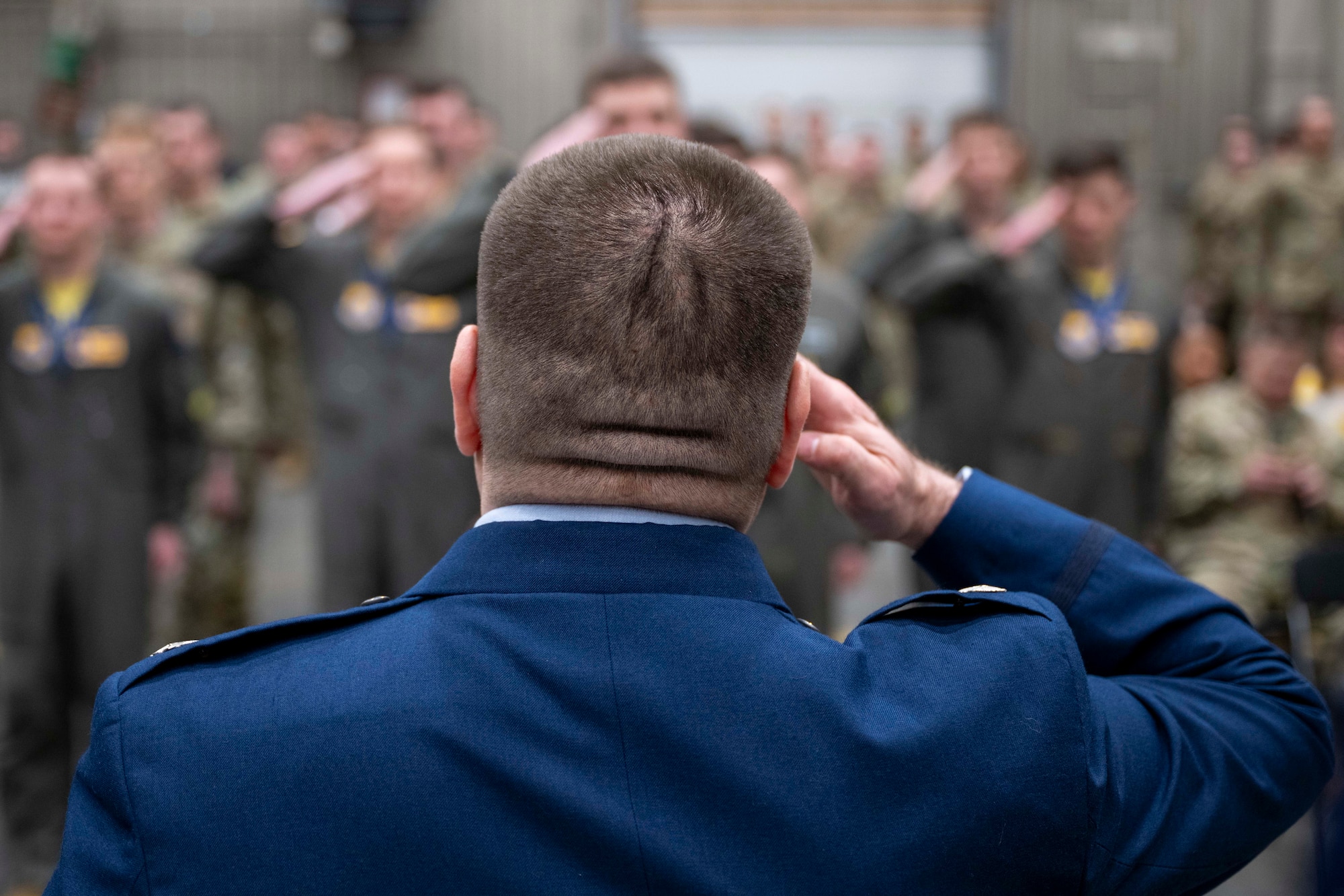 U.S. Air Force Lt. Col. Nathan Mondul, 18th Fighter Interceptor Squadron commander, renders his final salute to members of the 18th FIS during a change of command ceremony at Eielson Air Force Base, Alaska, May 8, 2026.