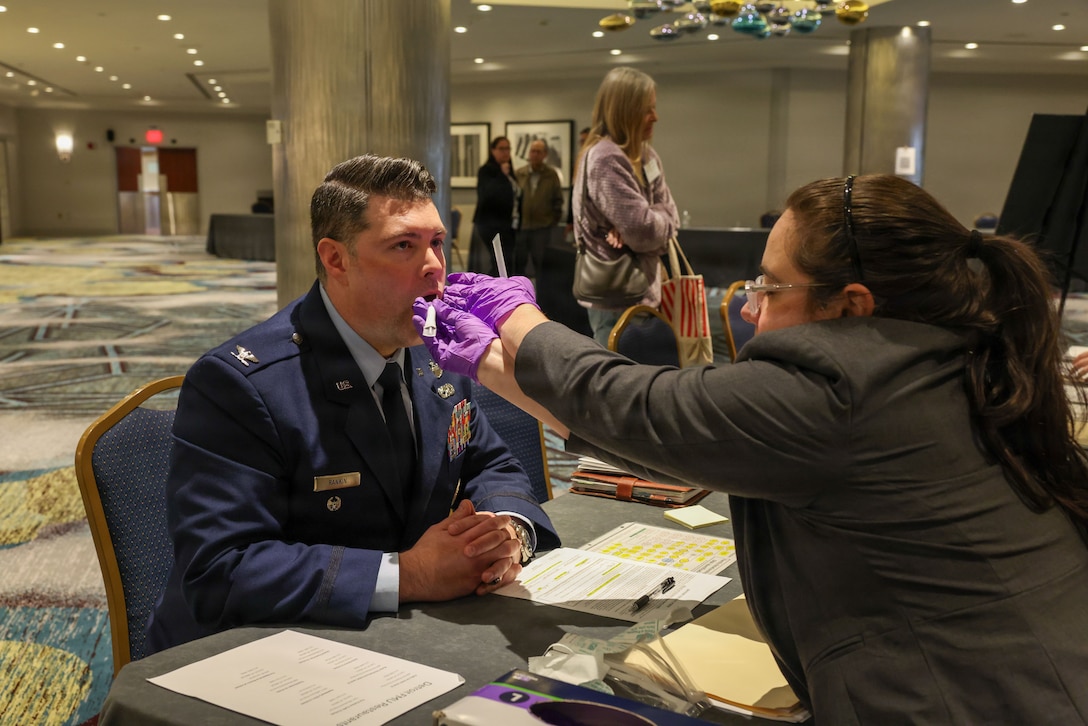 U.S. Air Force Col. Derek Rankin, chief of staff for the Defense POW/MIA Accounting Agency the Defense POW/MIA Accounting Agency, has his family reference sample taken during a family member update in Detroit, Mi., May 02, 2026.