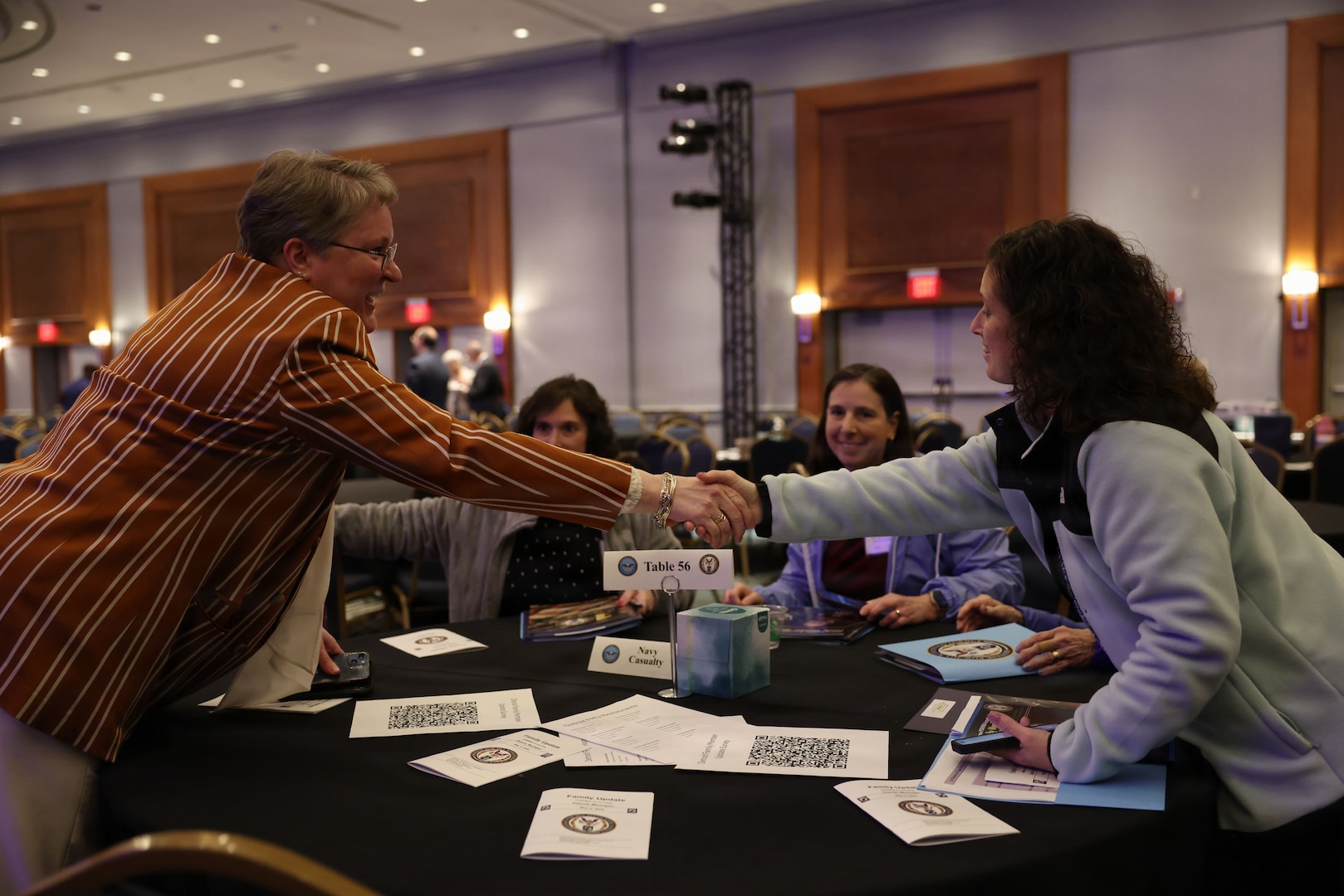 Jennifer Nasarenko, Defense POW/MIA Accounting Agency Outreach and Communications director, speaks to a family during a Family Member Update in Detroit, Mi., May 2, 2026.