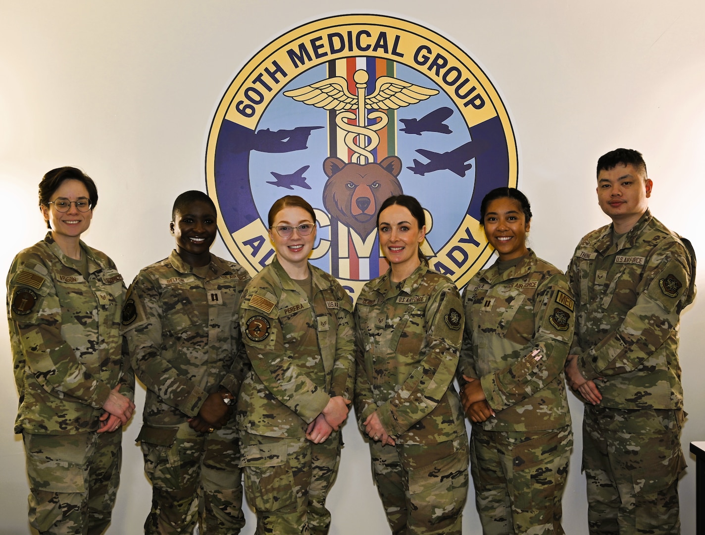 Members of the Continuous Medical Readiness (CMR) Cell at David Grant USAF Medical Center pose for a group photo at Travis Air Force Base, Calif., April 7, 2026. The CMR Cell supports medical readiness operations by coordinating deployment-related medical requirements and guiding Airmen through a streamlined readiness process. Capt. Isabella M. Cordova, officer in charge of the CMR Cell, is pictured fifth from left.