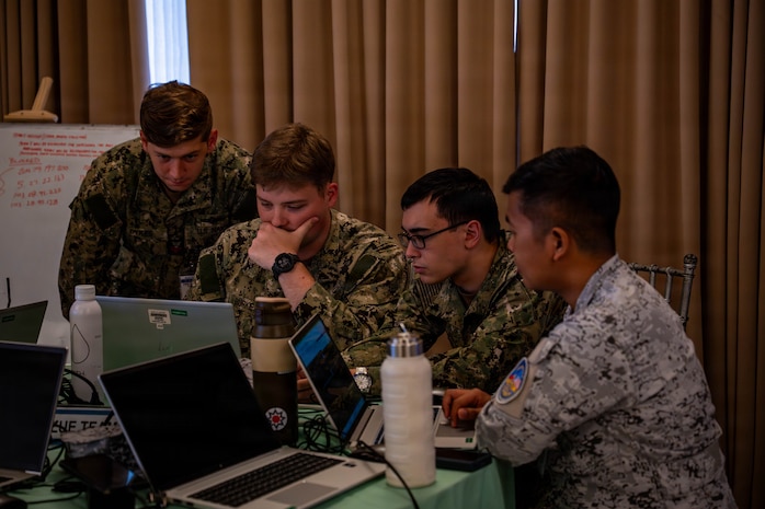 U.S. Navy and Philippine Navy service members work together during a cyber defense exercise in support of Exercise Balikatan 2026 at Camp Gen. Emilio Aguinaldo, Manila, Philippines, April 28, 2026.