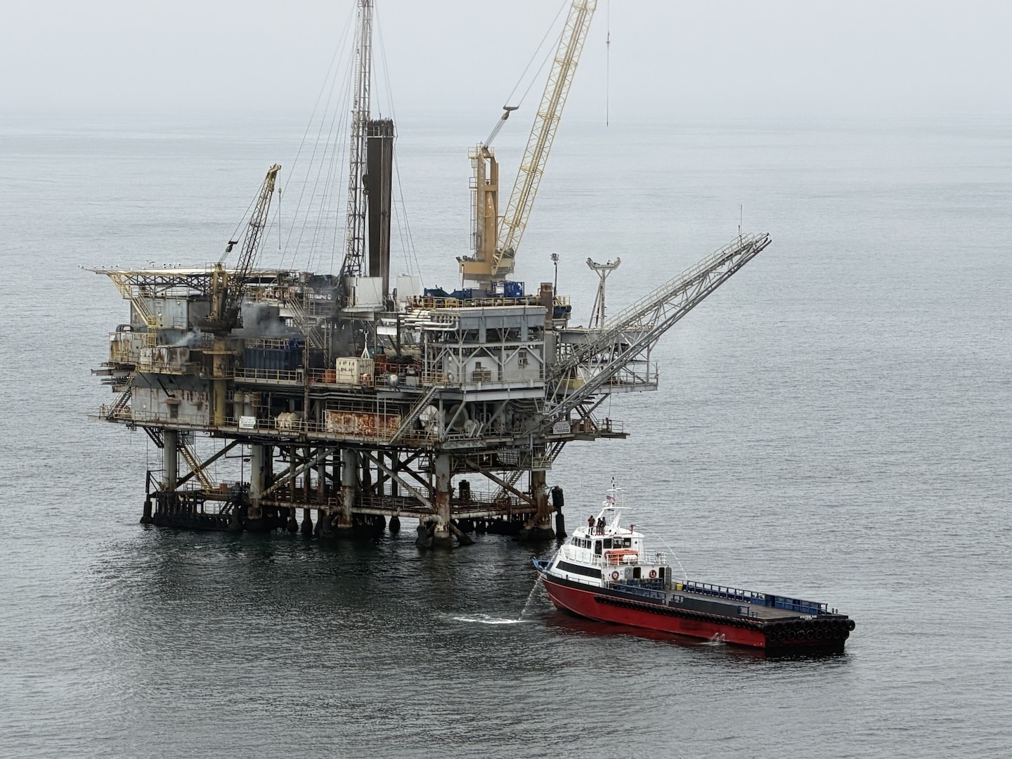 Coast Guard and agency partners respond to a fire onboard a non-operational natural gas platform offshore Santa Barbara, May 11, 2026. A fire occurred aboard platform Habitat when platform personnel were conducting decommissioning operations for the platform. All crew members were evacuated with no reported injuries. (U.S. Coast Guard Courtesy photo)