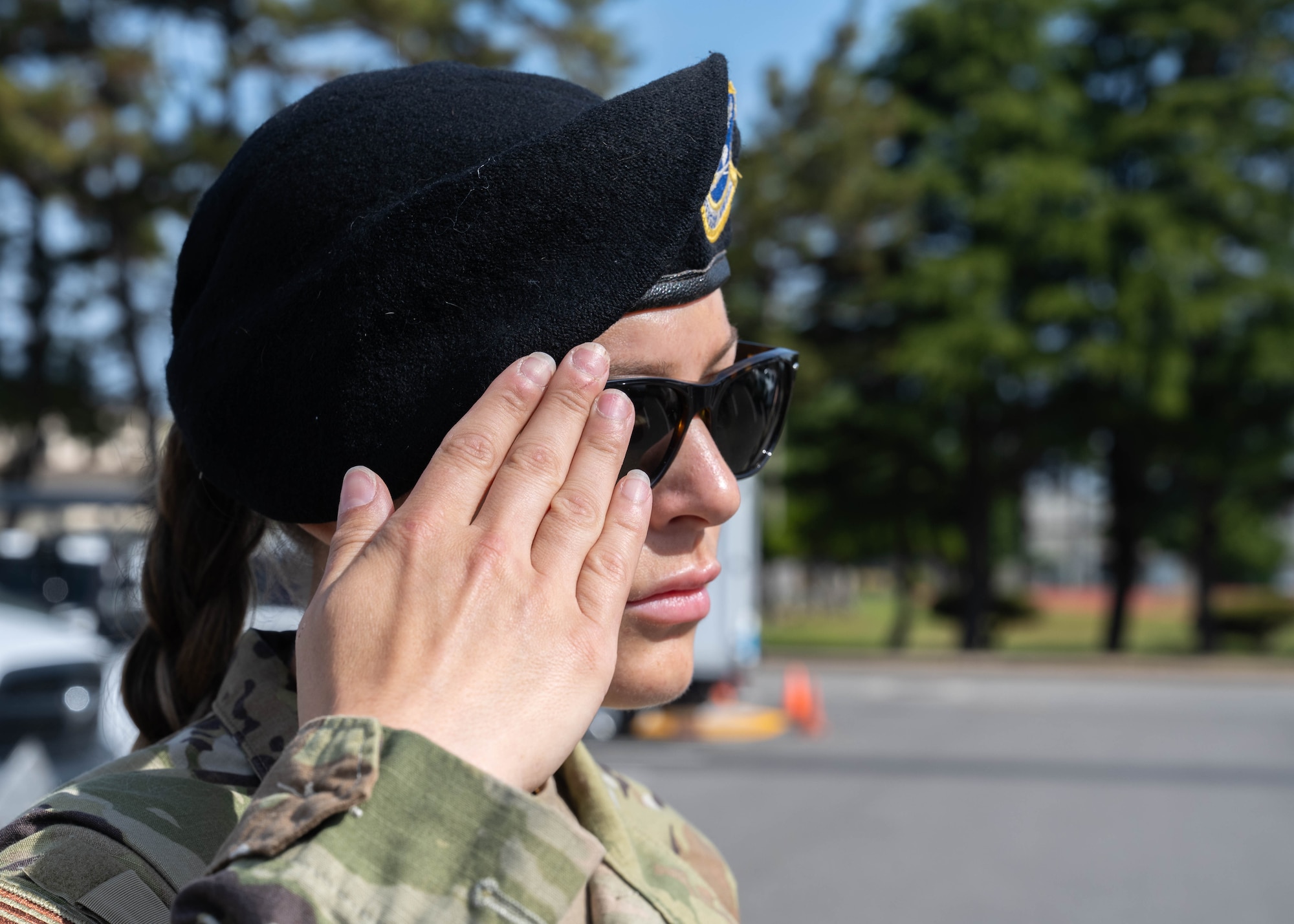 Airman salutes.
