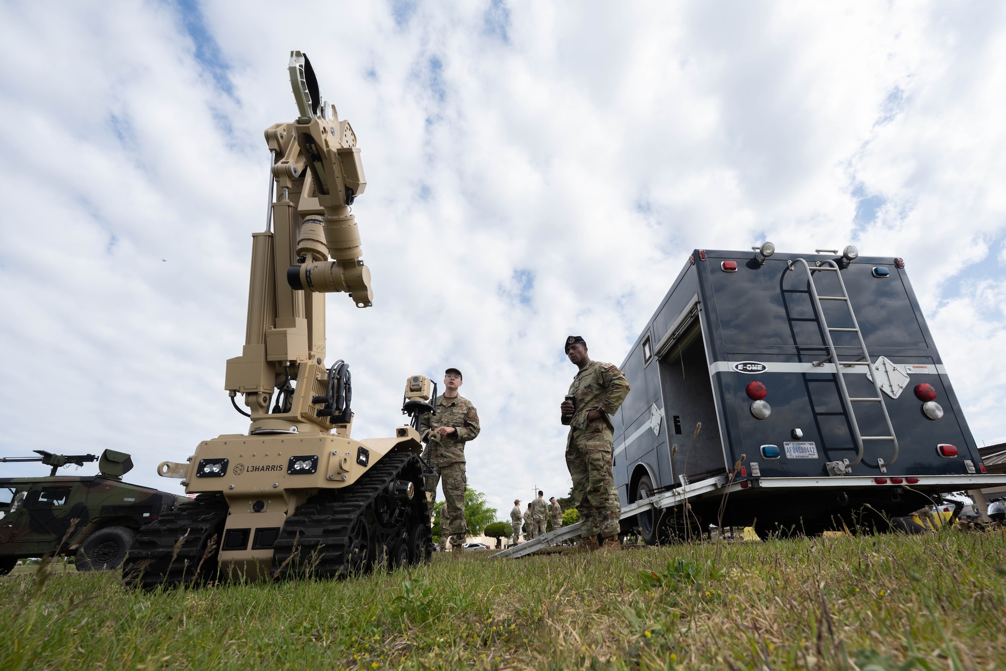 Airman demonstrates explosive ordnance disposal robot capabilities.
