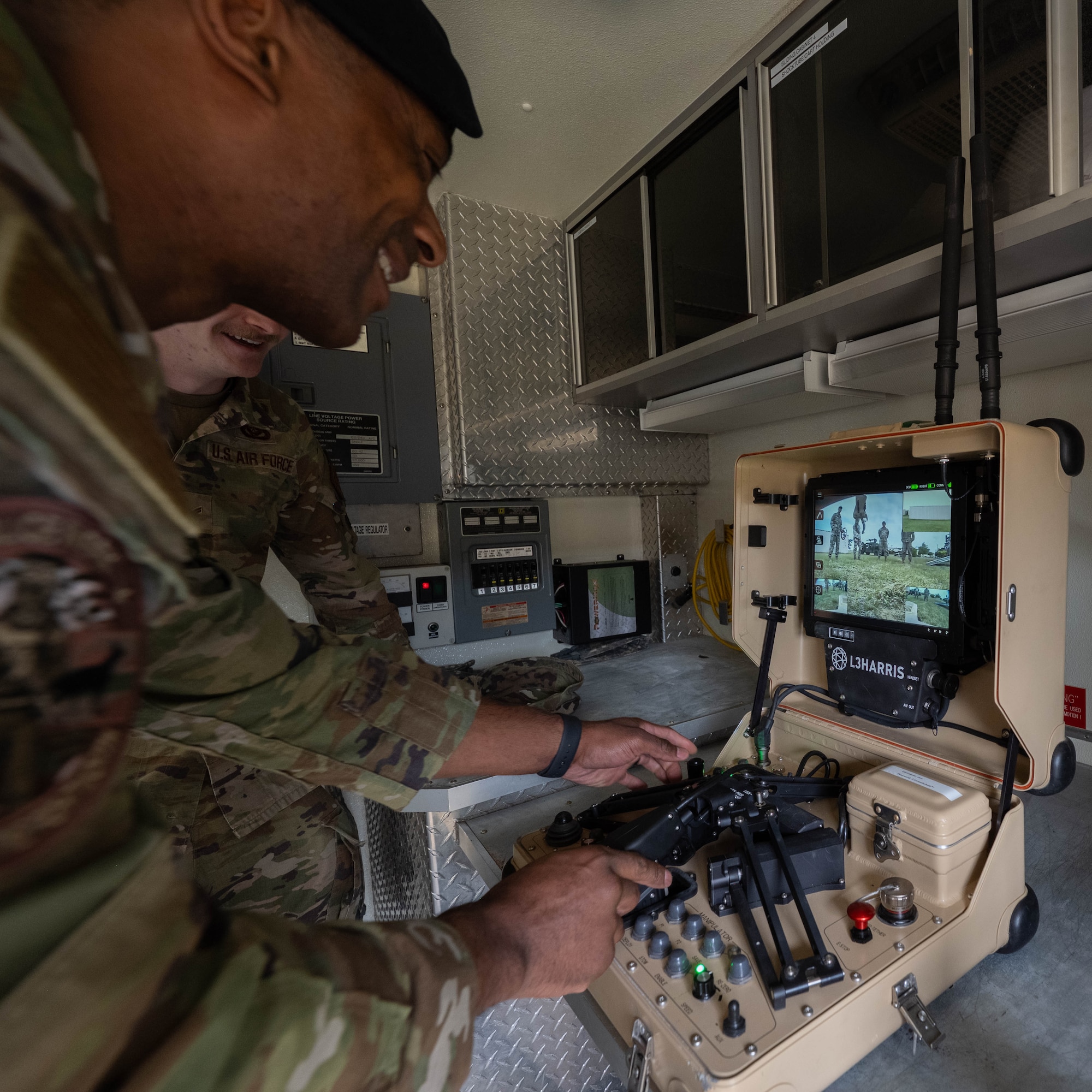 Airman uses control pad.
