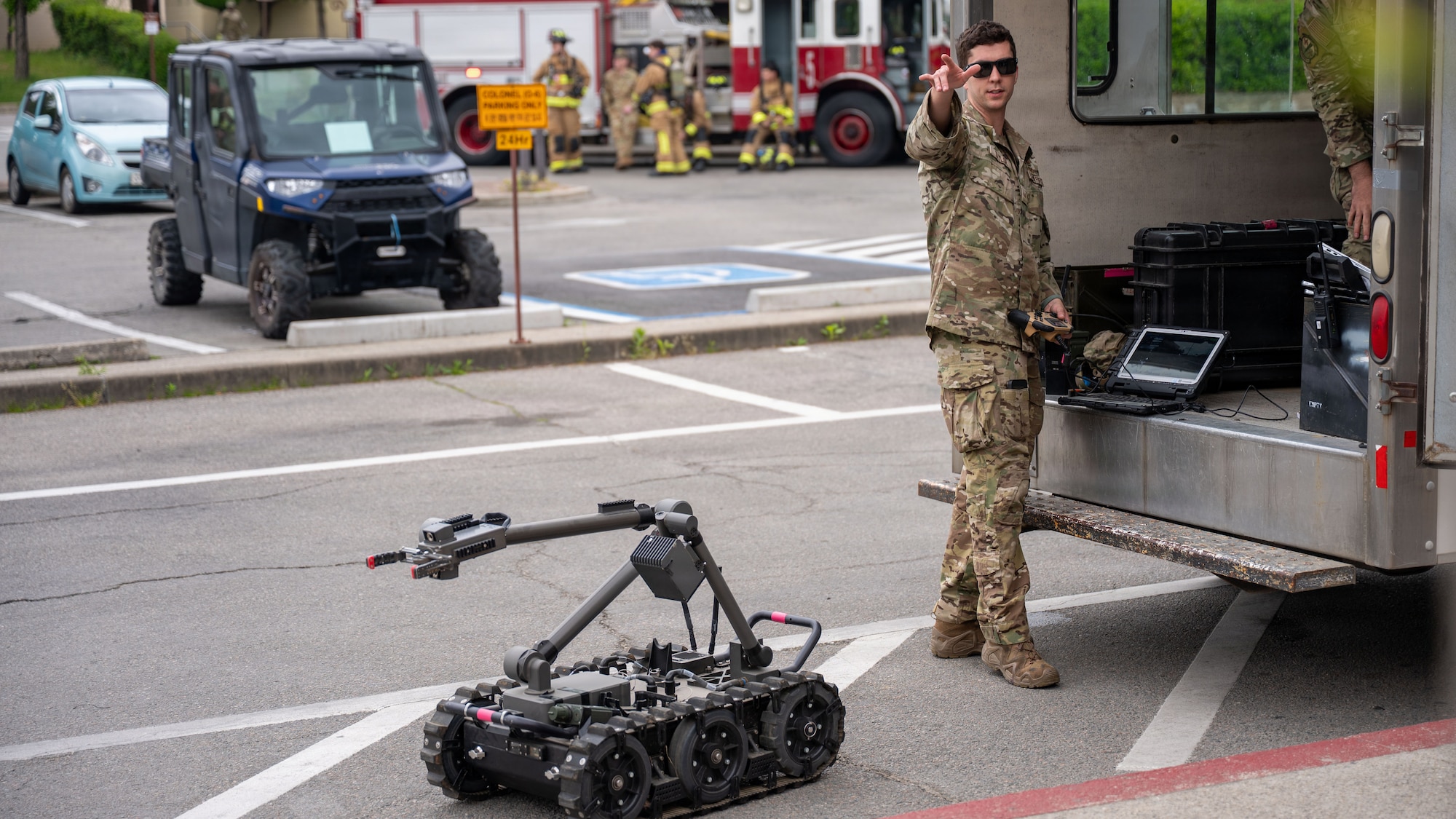 U.S. Air Force Staff Sgt. John Taylor, 51st Civil Engineer Squadron noncommissioned officer in charge of equipment, operates a Man Transportable Robotic System Increment II during a simulated bomb threat exercise during Mustang Rodeo at Osan Air Base, Republic of Korea, May 11, 2026. The training scenario brought together security forces, fire emergency services and explosive ordnance disposal personnel to rehearse emergency response operations. (U.S. Air Force photo by Senior Airman Rome Bowermaster)