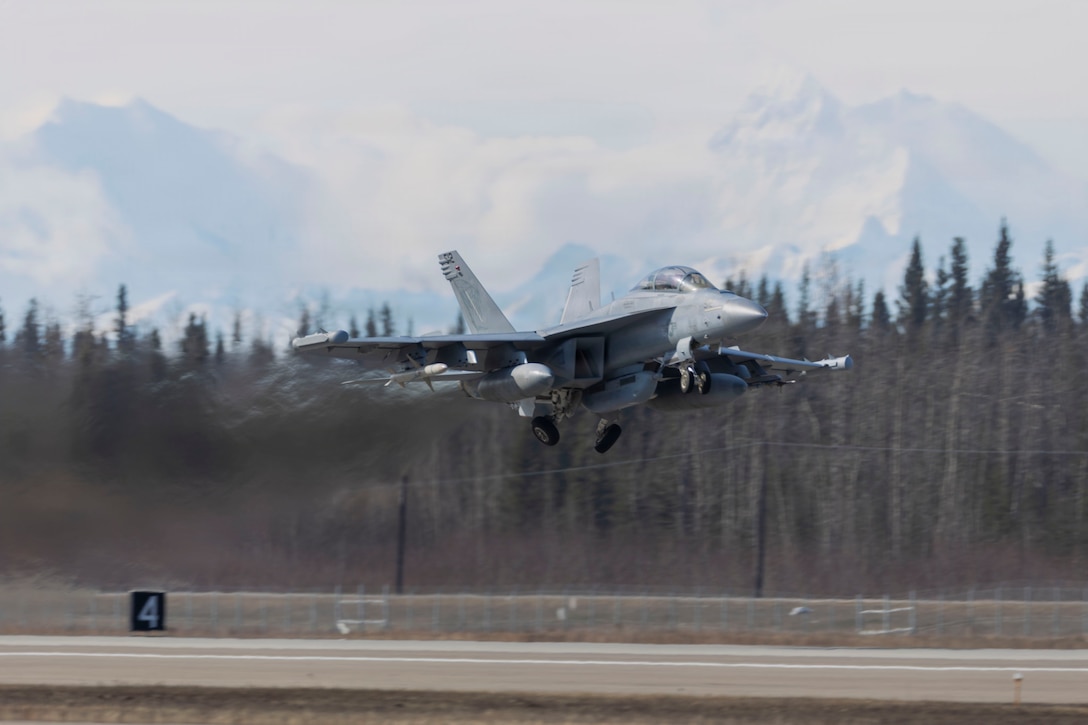 A U.S. Navy EA-18G Growler with Electronic Attack Squadron (VAQ) 138 takes off during exercise Red Flag-Alaska 26-1 at Eielson Air Force Base, Alaska, April 30, 2026. Red Flag-Alaska is a Pacific Air Forces-led exercise designed to simulate complex scenarios in a realistic training environment, providing unique opportunities to integrate joint and coalition forces into multilateral training, enhancing our ability to respond to contingencies in the region. (U.S. Marine Corps photo by Lance Cpl. Bryan Giraldo)