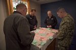 PORTSMOUTH, Va. (May 8, 2026) Chaplains assigned to Naval Medical Center Portsmouth (NMCP) perform prayers during National Day of Prayer at NMCP, May 8, 2026. Navy Medicine Readiness and Training Command (NMRTC) Portsmouth is the premier readiness and training platform that provides superior medical training for military medical service members at NMCP, the U.S. military’s oldest, continuously operating military hospital since 1830. (U.S. Navy photo by Mass Communication Specialist 2nd Class Thomas Boatright)
