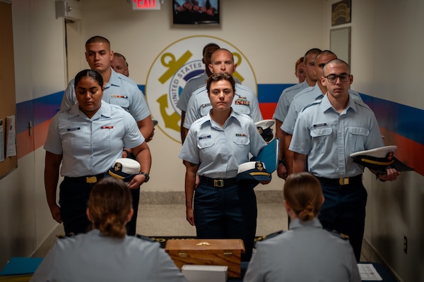 Members of Coast Guard Officer Candidate School (OCS) Class 1-25 and the National Oceanic and Atmospheric Administration (NOAA) Basic Officer Course (BOTC) 144 reported for training at the Coast Guard Academy, July 23, 2024. The future officers will go on to serve their respective branches across the nation as pilots, sailors, and scientific specialists. (U.S Coast Guard photo by Petty Officer 3rd Class Matt Thieme.)
