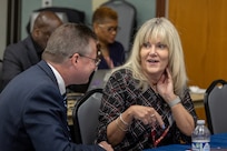 Melissa Sikora, Defense Finance and Accounting Service Enterprise Accounting and Audit Support director, and Shawn McCracken, DFAS Indianapolis site director, talk during the 2026 U.S. Army-DFAS Financial Management Workshop at the Maj. Gen. Emmett J. Bean Federal Center May 12, 2026. The two-day, in-person workshop, hosted by both the Office of the Assistant Secretary of the Army and DFAS, brought together financial management leaders from around the Department of War, OASA (FM&C), DFAS and the U.S. Army Financial Management Command to coordinate on key initiatives such as audit readiness, reorganizations, total force pay, and more. (U.S. Army photo by Mark R. W. Orders-Woempner)