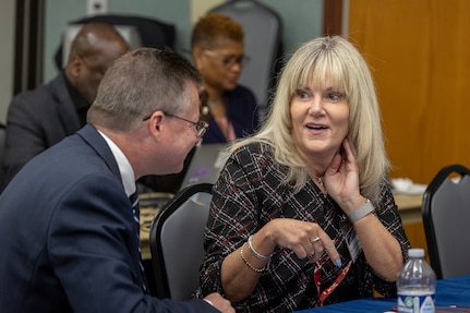Melissa Sikora, Defense Finance and Accounting Service Enterprise Accounting and Audit Support director, and Shawn McCracken, DFAS Indianapolis site director, talk during the 2026 U.S. Army-DFAS Financial Management Workshop at the Maj. Gen. Emmett J. Bean Federal Center May 12, 2026. The two-day, in-person workshop, hosted by both the Office of the Assistant Secretary of the Army and DFAS, brought together financial management leaders from around the Department of War, OASA (FM&C), DFAS and the U.S. Army Financial Management Command to coordinate on key initiatives such as audit readiness, reorganizations, total force pay, and more. (U.S. Army photo by Mark R. W. Orders-Woempner)
