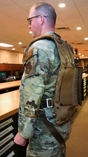Airman wears parachute