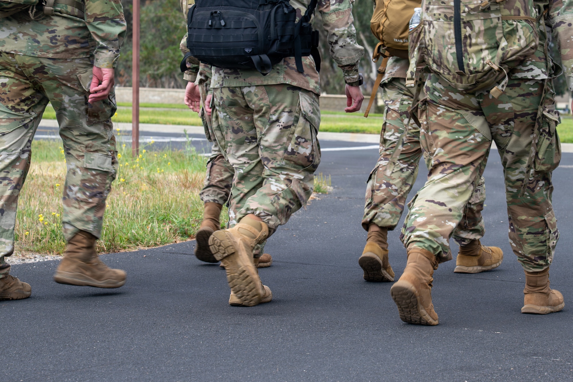 Legs of servicemembers moving.