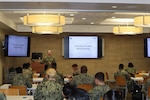 Lt. Cmdr. Jeff Hebert, laboratory department head for Naval Medical Center San Diego, teaches the basics of blood banking on the first day of a two-day walking blood bank training event at Naval Hospital Camp Pendleton on May 11, 2026. “This training is to prepare you for walking blood bank operations at a role 2 or role 3 facility,” he stated at the beginning of the training evolution.
