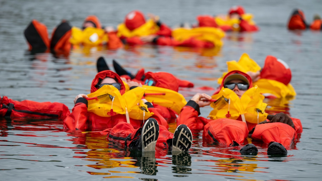 people floating in water