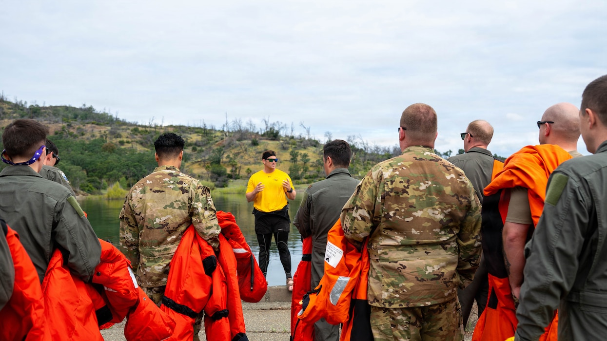 a person talking to a group of people.