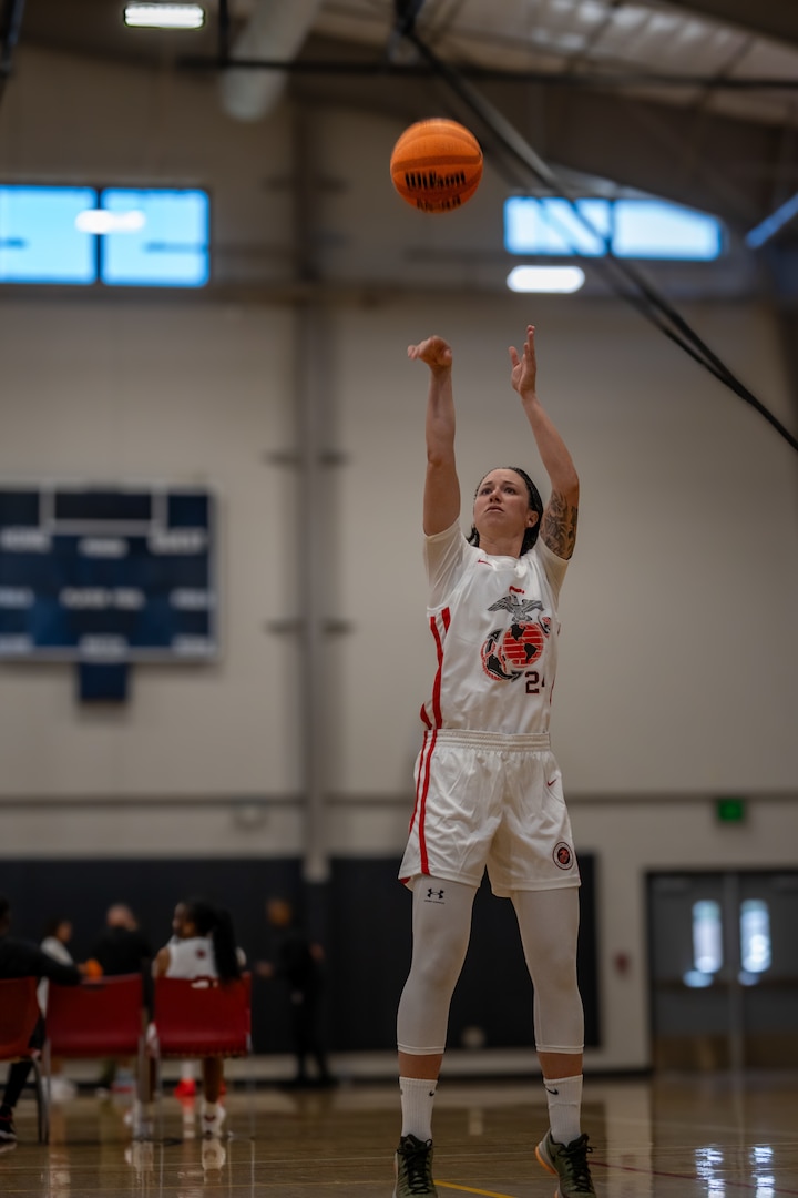 Service members compete during the Armed Forces Basketball Championship at Paige Field House on Marine Corps Base Camp Pendleton, May 12, 2026. Service members competed for championship honors while representing their respective services.