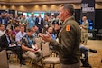 U.S. Army Brig. Gen. William Parker, commanding general of the 94th Army Air and Missile Defense Command (AAMDC), speaks to an audience during the Land Forces of the Pacific Symposium and Exposition (LANPAC) on May 12, 2026.