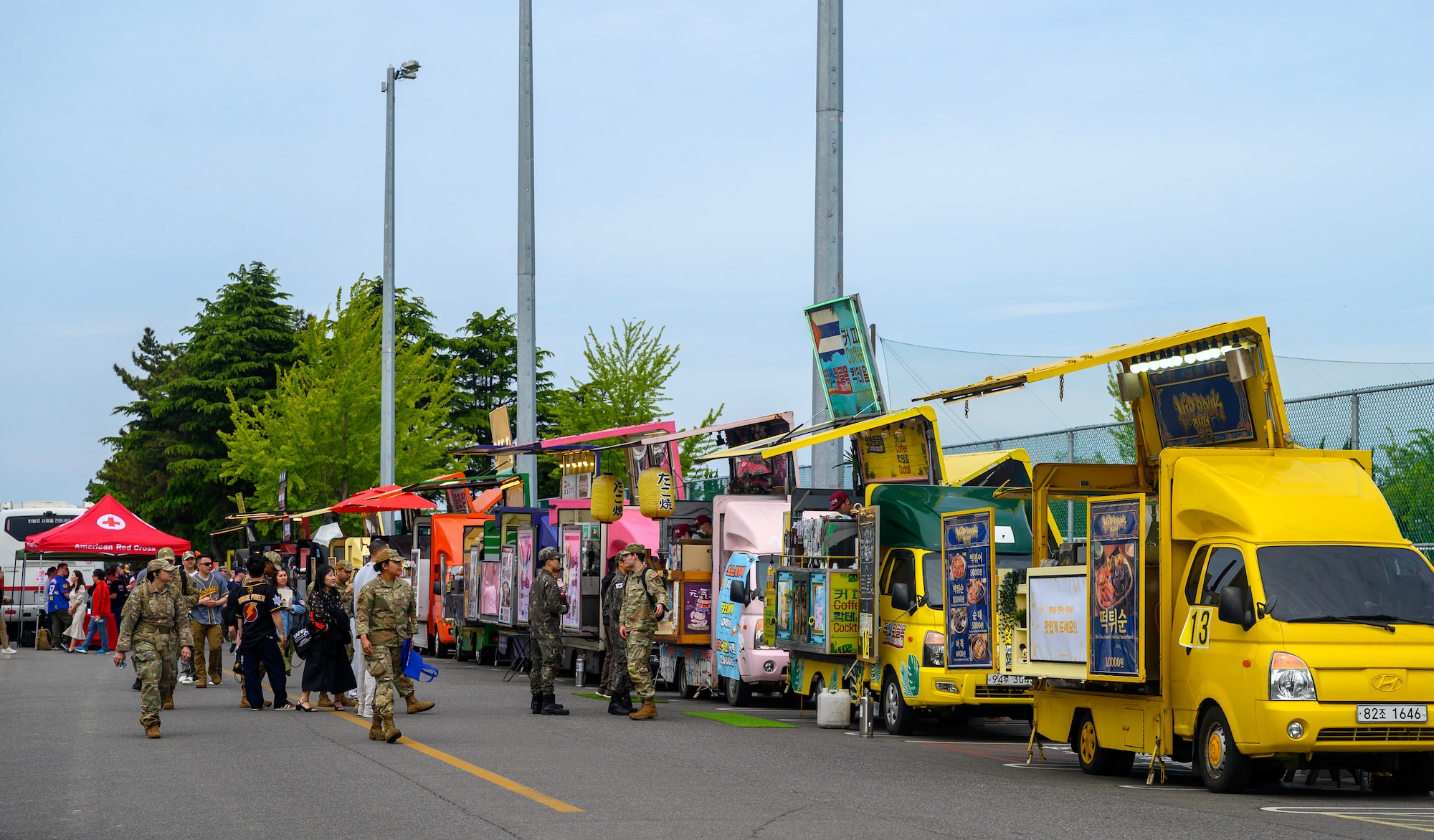 Airmen visit food trucks.
